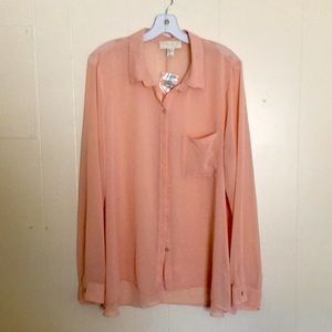 This is a brand new (see-through) blouse.